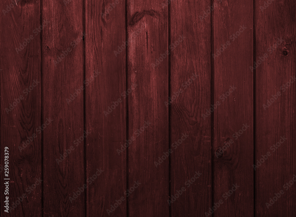 Old dark red wooden wall, detailed background photo texture.