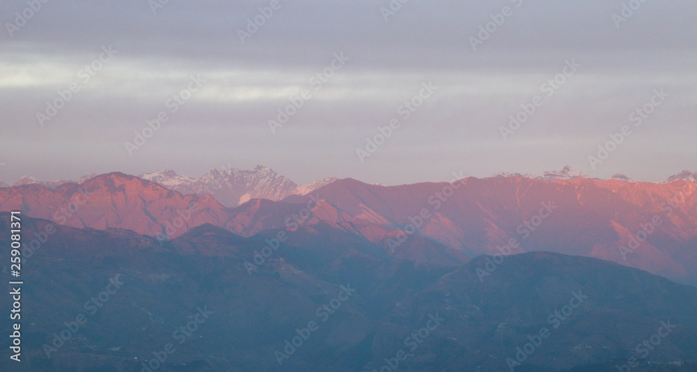 Fototapeta premium The Himalayas after the sunset, Chamba Valley, Himachal Pradesh, India.
