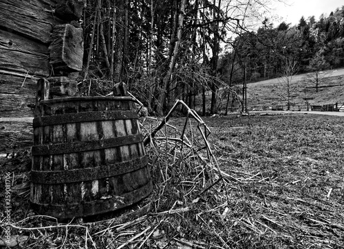 old cottage hut barrel black and white