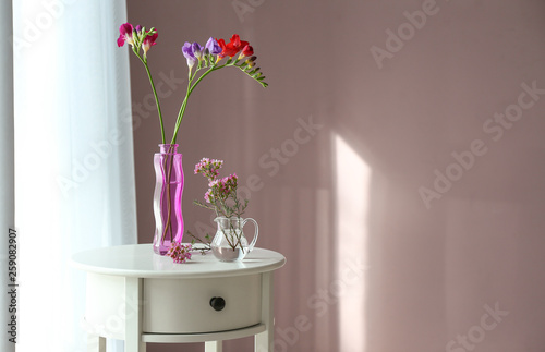 Beautiful flowers on table in room