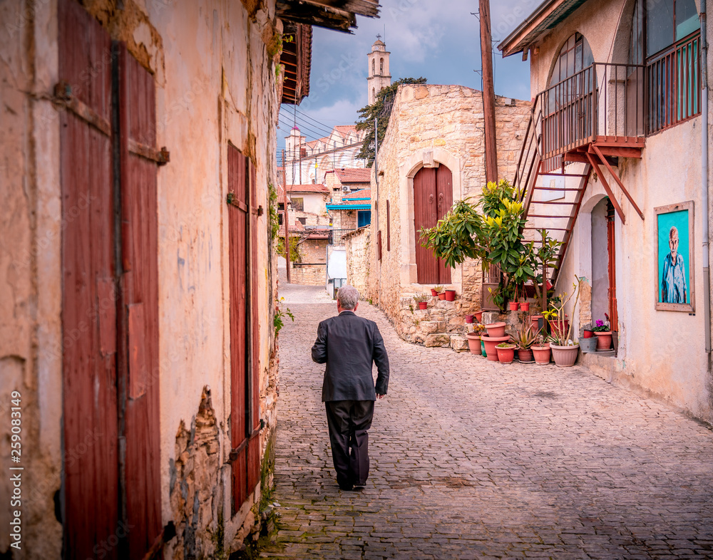 Old stone houses on a narrow streets in the picturesque medieval city of Lofou. Limassol District, Cyprus