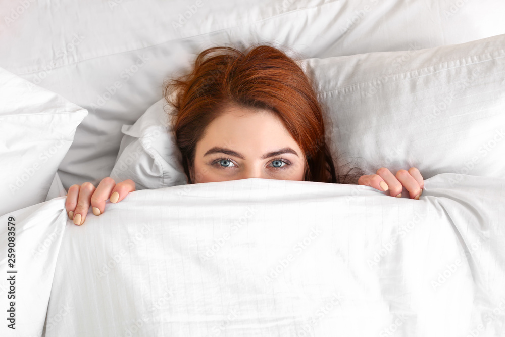Morning of beautiful young woman lying in bed Morning of beautiful young woman lying in bed