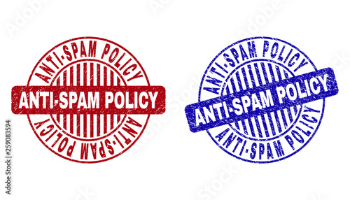 Grunge ANTI-SPAM POLICY round stamp seals isolated on a white background. Round seals with grunge texture in red and blue colors.