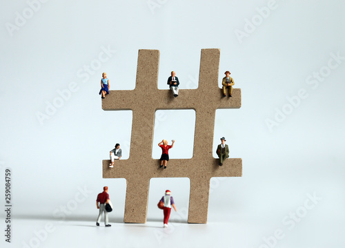 Hashtags and various miniature people.