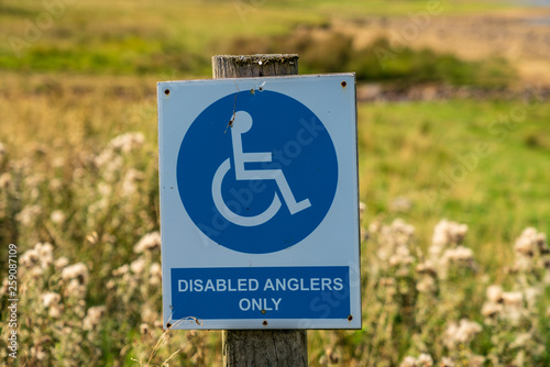 Sign: Disabled anglers only, seen at the Derwent Reservoir in County Durham, England, UK photo