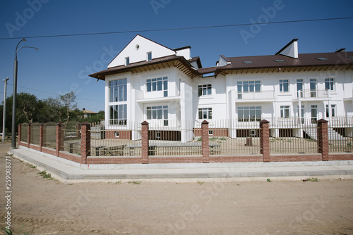 Large two-storey white country house