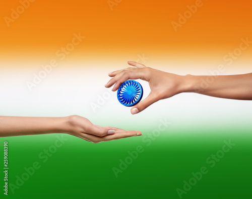 Ashoka chakra holding by hands - Image  photo