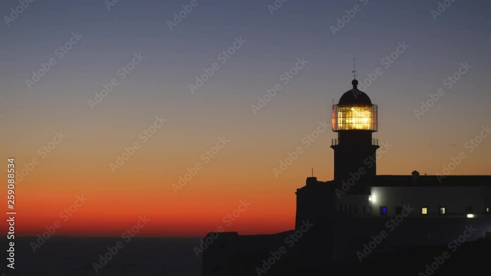 Lighthouse in the evening just after sunset. Cape St. Vincent, Portugal. St. Vincent is the southwesternmost point of Portugal and of mainland Europe. 4K Lighthouse in the evening just after sunset. Cape St. Vincent, Portugal. St. Vincent is the southwesternmost point of Portugal and of mainland Europe. 4K