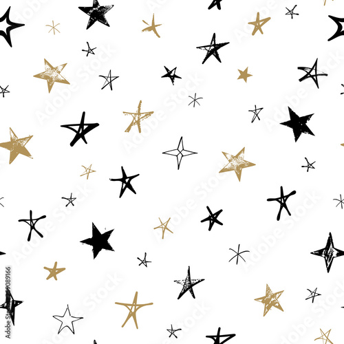Seamless pattern with black and gold hand drawn vector stars in doodle style isolated on white background. 