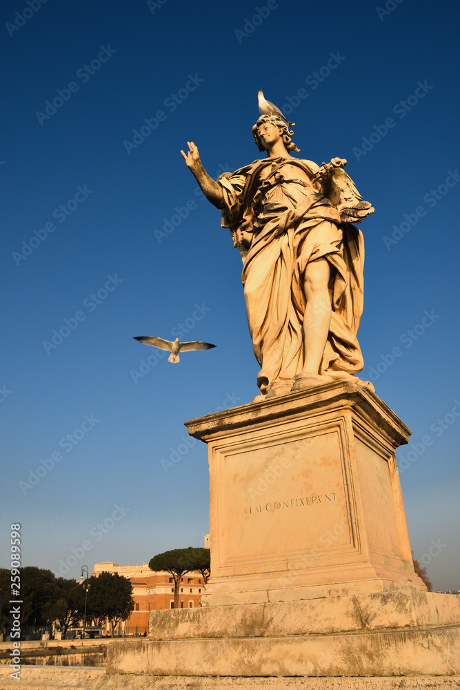 Angel figure on the Aelian Bridge that leads to the Castle of the Holy Angel in Rome. 