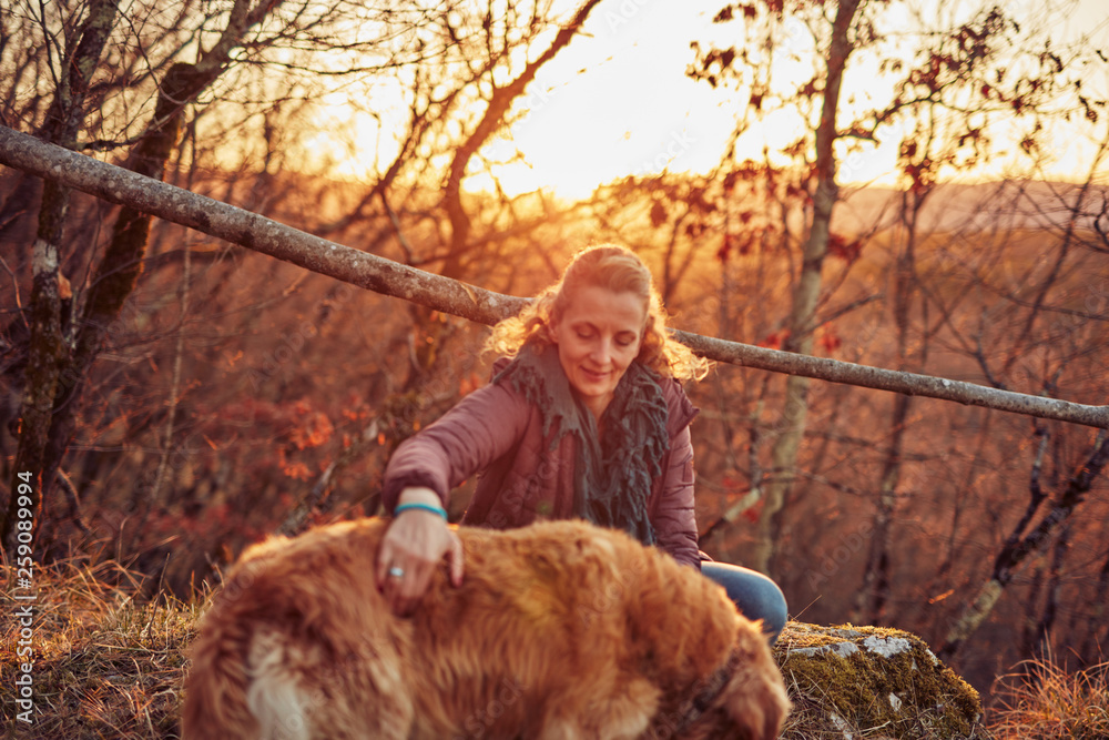 Two friends enjoying sunset / sunrise time in nature. Two friends enjoying sunset / sunrise time in nature.