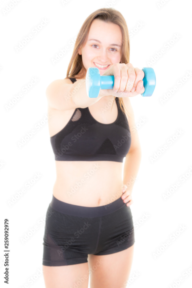blurred woman in gym exercising with blue dumbbells blurred woman in gym exercising with blue dumbbells
