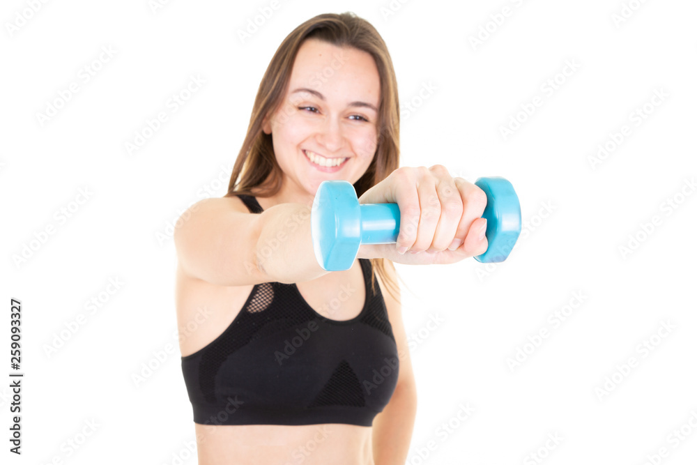 smiling beautiful young sporty woman with blue dumbbell smiling beautiful young sporty woman with blue dumbbell
