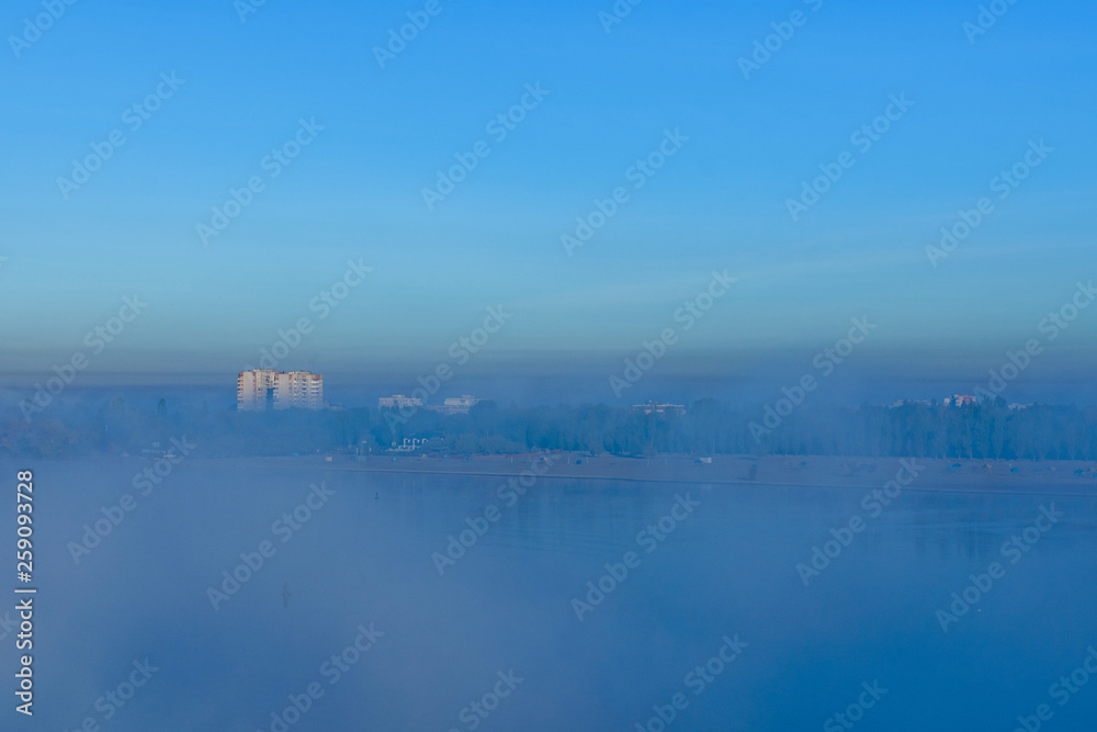 City Kremenchug in fog on autumn day