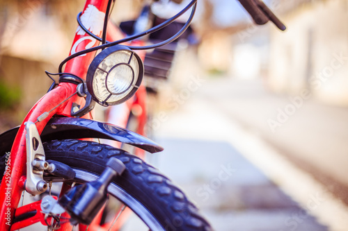 Bike in the city: Front picture of a city bike, blurred background photo