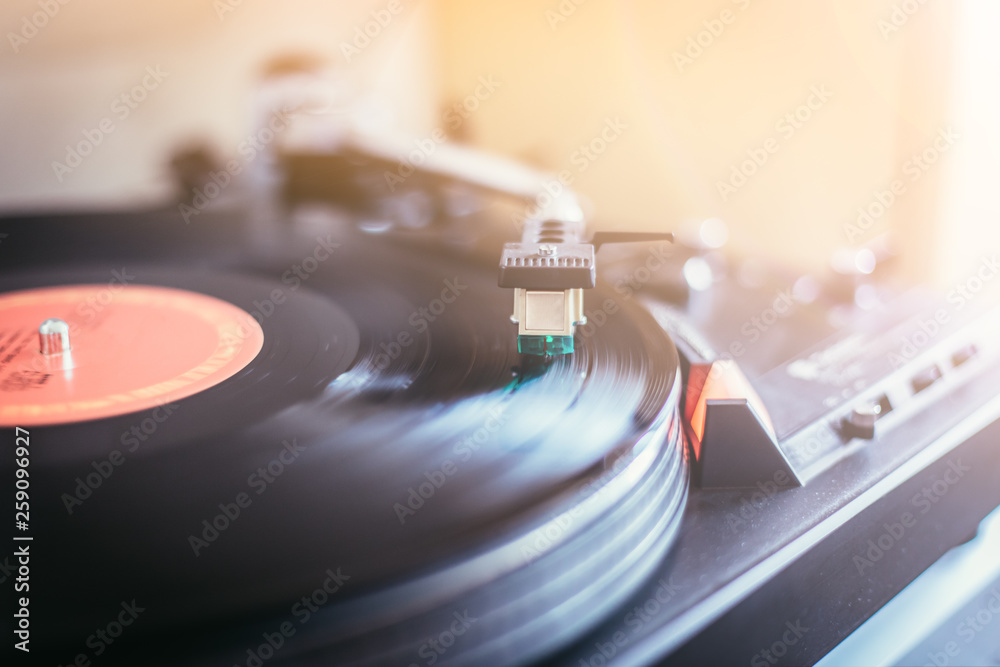 Fototapeta Playing retro music: Professional turnable audio vinyl record music player