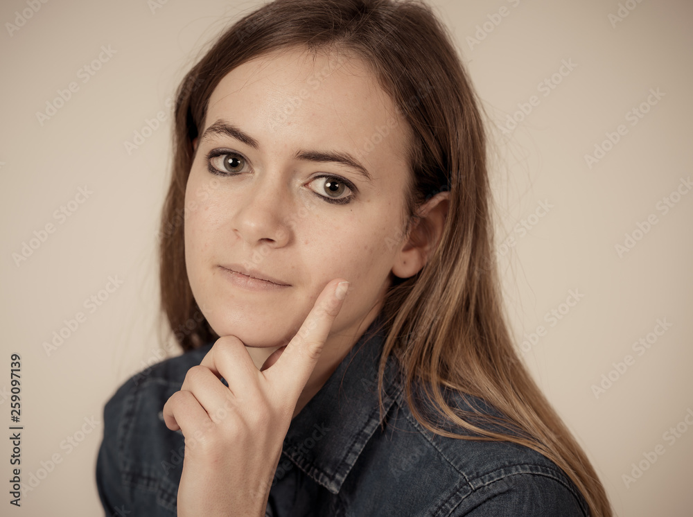 Portrait of pretty teenager girl posing for the camera In beauty, model and fashion concept Portrait of pretty teenager girl posing for the camera In beauty, model and fashion concept