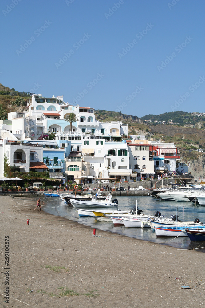 Boats on the beach at Sant Angelo, Ischia, Italy. A picturesque fishing vilage and tourist resort in summer.