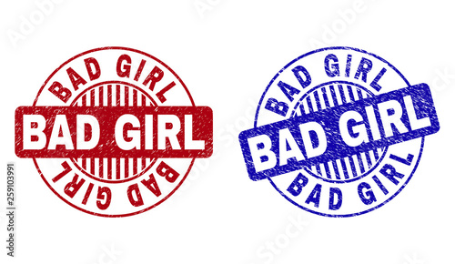 Grunge BAD GIRL round stamp seals isolated on a white background. Round seals with distress texture in red and blue colors. Vector rubber watermark of BAD GIRL title inside circle form with stripes.