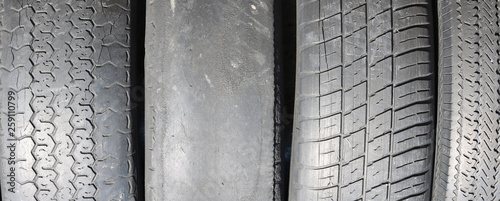 worn out bald old car tire close-up