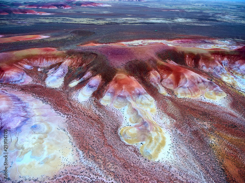 Fototapeta Naklejka Na Ścianę i Meble -  Colored chalk formations in Akzhar mountains, Kazakhstan. Colored chalk formations in Akzhar mountains are located in Central Kazakhstan.