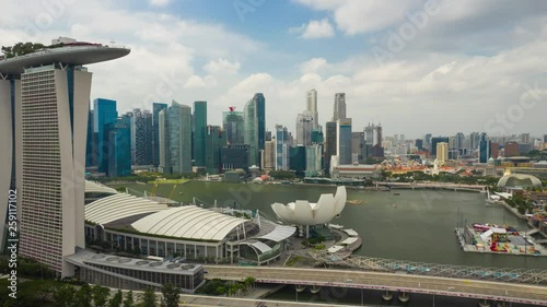 singapore city sunny day flight over famous hotel marina bay aerial panorama 4k timelapse photo