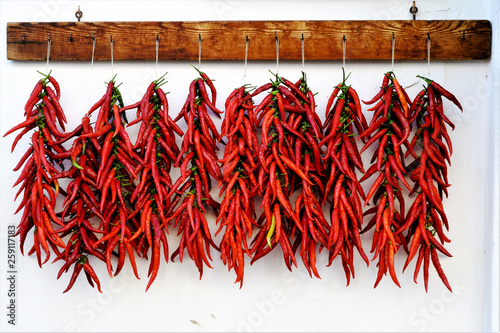 Billede på lærred Red chilli peppers dried in the sun of Calabrai, Italy