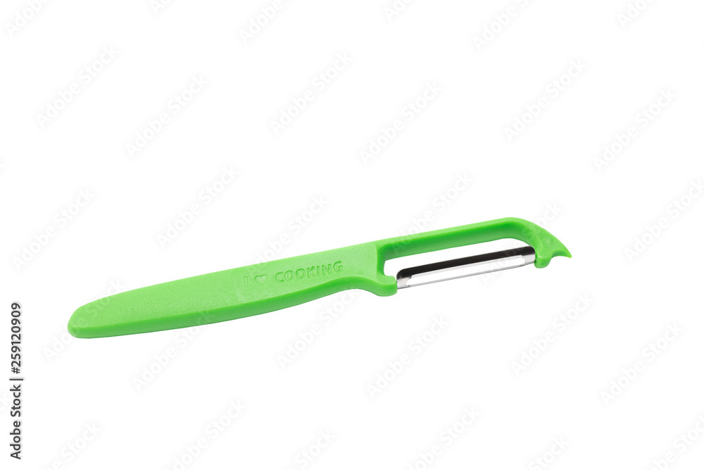 Vegetable peeler. Isolated on white background, top view, close up. Vegetable peeler. Isolated on white background, top view, close up.