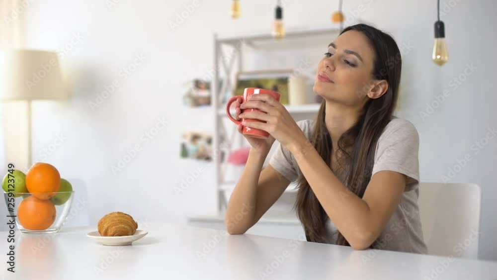 Beautiful woman enjoying morning coffee, nice beginning of day, relaxation Beautiful woman enjoying morning coffee, nice beginning of day, relaxation