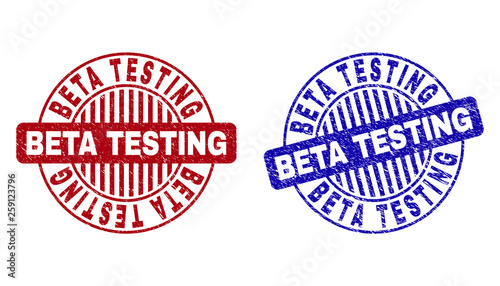 Grunge BETA TESTING round stamp seals isolated on a white background. Round seals with grunge texture in red and blue colors.