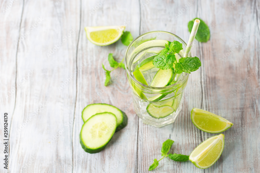 Fototapeta premium Infused water with fresh citrus fruits and ice