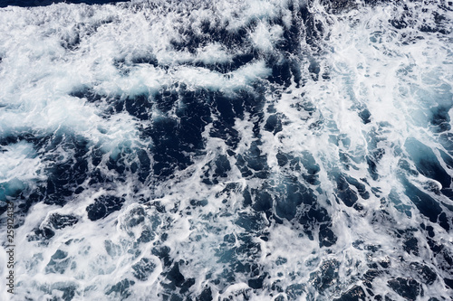 Aerial view to ocean waves.