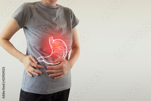 Digital composite of highlighted stomach of woman photo