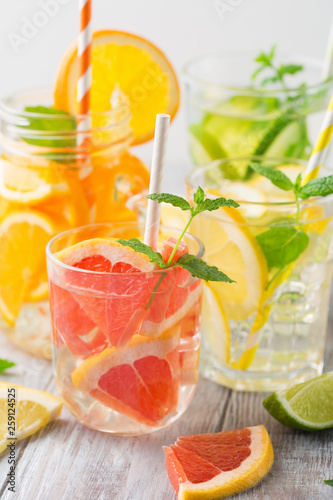 Infused water with fresh citrus fruits and ice