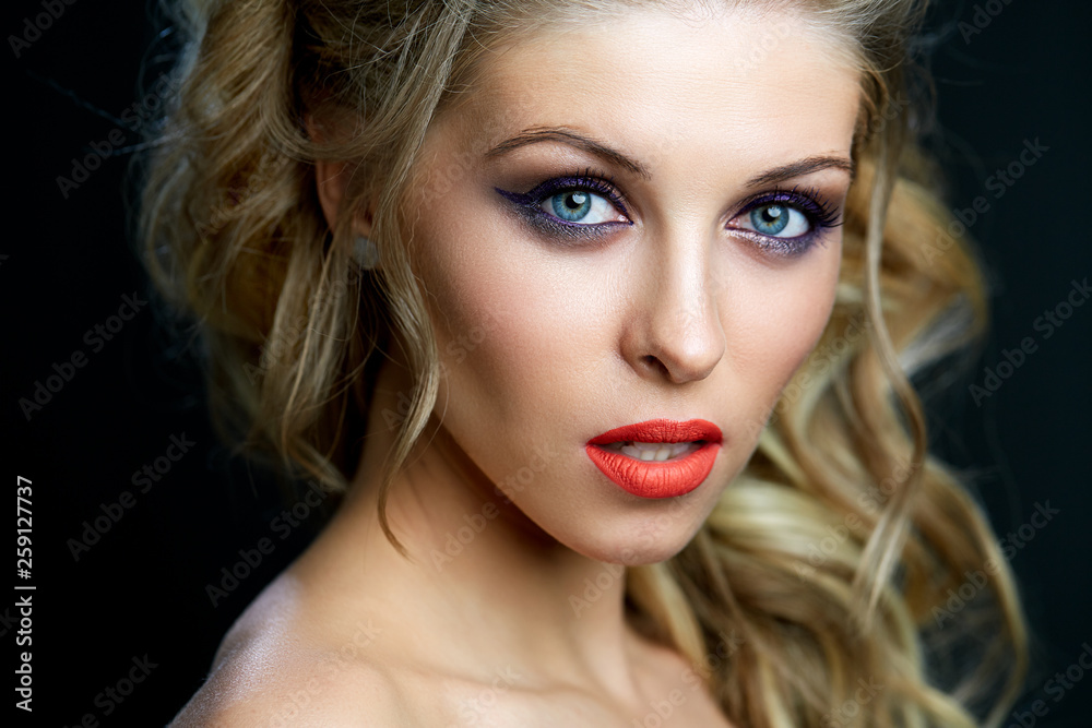 Close-up portrait of caucasian young woman with beautiful blue eyes Close-up portrait of caucasian young woman with beautiful blue eyes