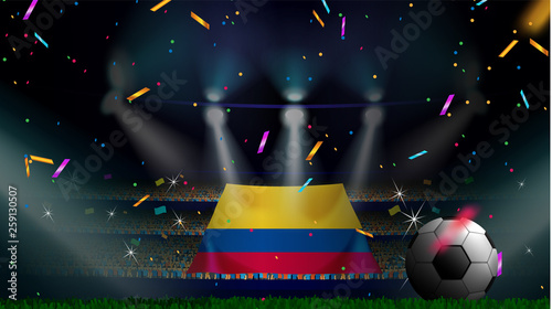 Fans hold the flag of Colombia among silhouette of crowd audience in soccer stadium with confetti to celebrate football game. Concept design for football result template