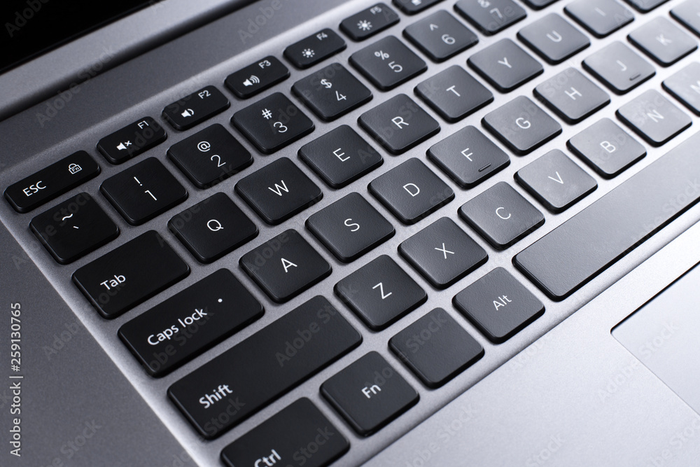 Close-up photo of stylish modern computer or notebook. Close-up photo of stylish modern computer or notebook.