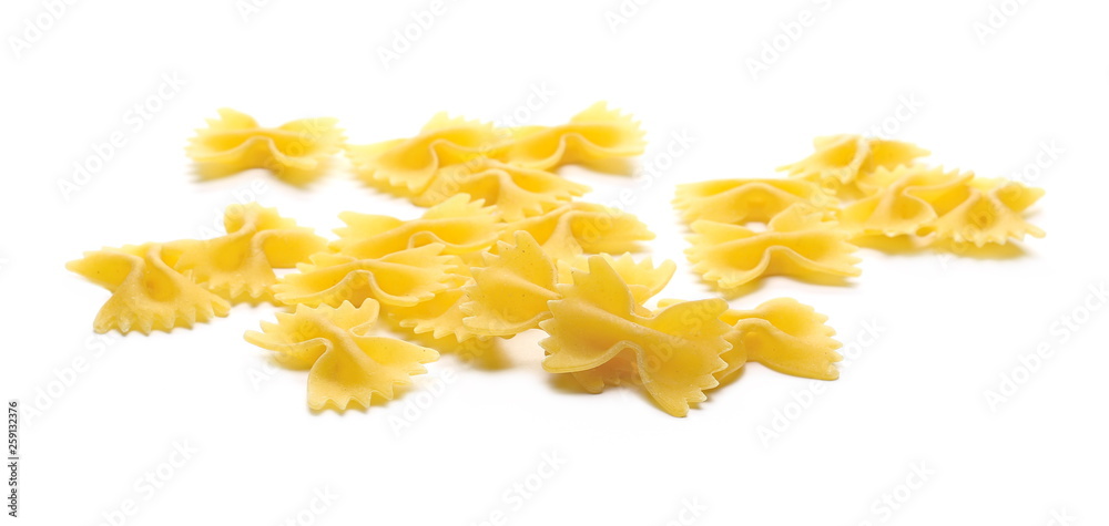 Farfalle pasta pile isolated on white background Farfalle pasta pile isolated on white background