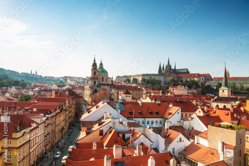 View of Prague rooftops, St. Vitus Cathedral and St. Nicholas Cathedral. Czech republic