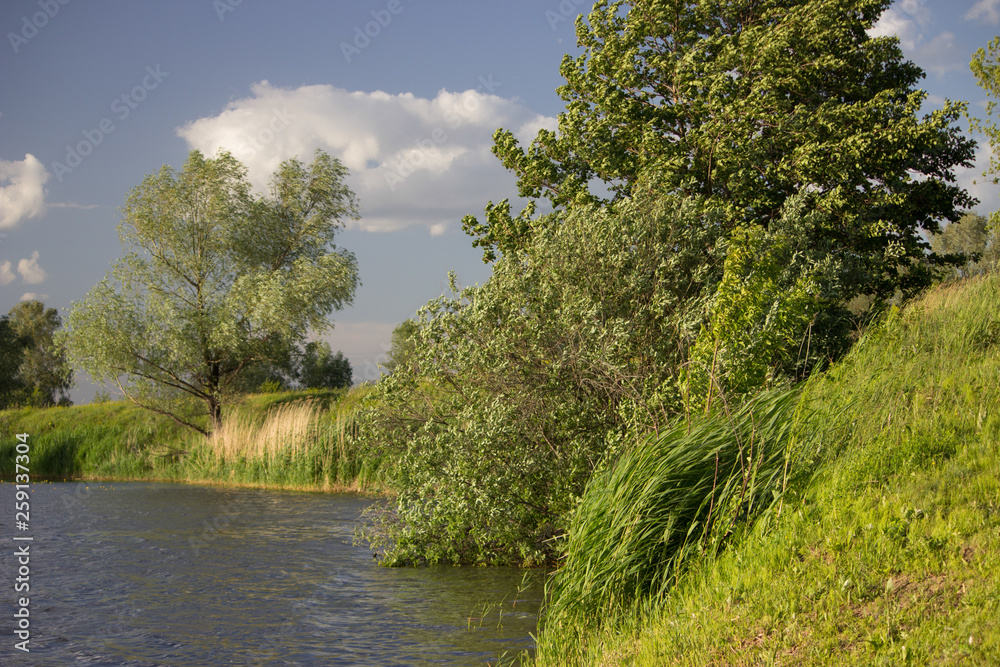 Reflection on the water surface of a serene river with paths of light. Glare. Reflection on the water surface of a serene river with paths of light. Glare.