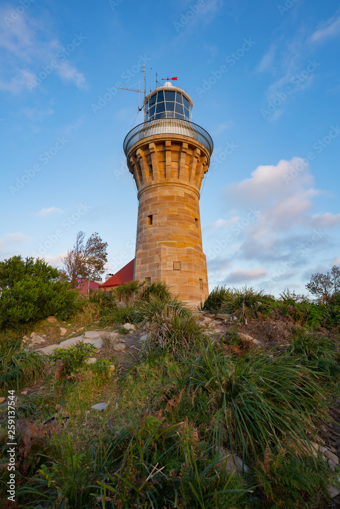 lighthouse on coast of sea