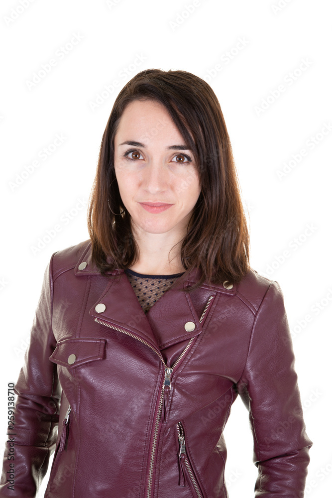 Portrait of young pretty positive girl smiling looking at camera in leather jacket over white background Portrait of young pretty positive girl smiling looking at camera in leather jacket over white background