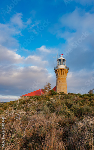 lighthouse on coast of sea