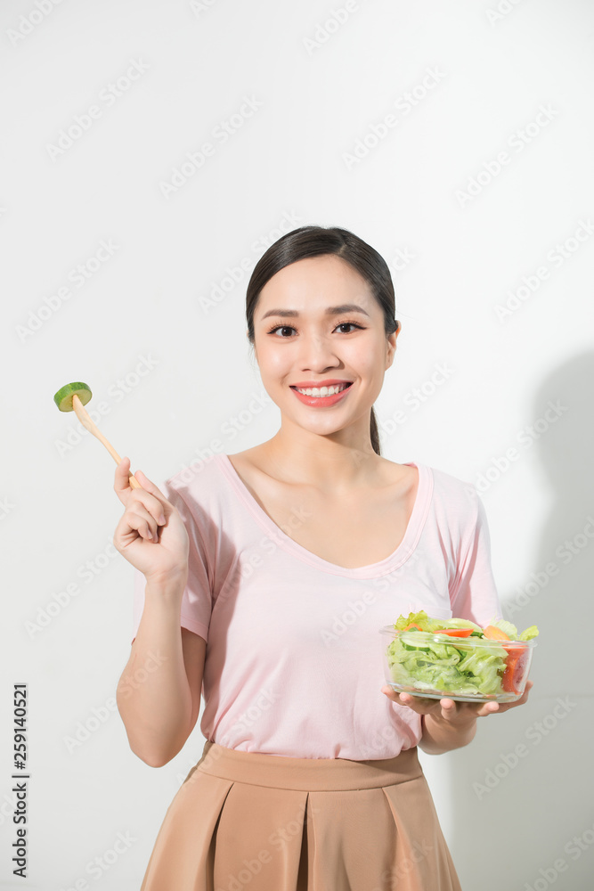 'Happy young Asian woman with fresh vegetable and fresh fruit,healthy concept. 'Happy young Asian woman with fresh vegetable and fresh fruit,healthy concept.