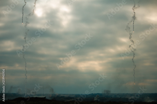 War concept. Military training ground with the explosions. Fighting operation