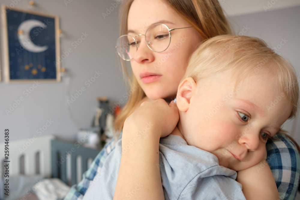 Baby crying on mom's shoulder Baby crying on mom's shoulder