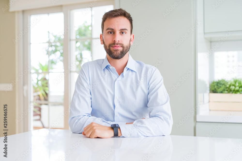 Handsome business man Relaxed with serious expression on face. Simple and natural looking at the camera. Handsome business man Relaxed with serious expression on face. Simple and natural looking at the camera.