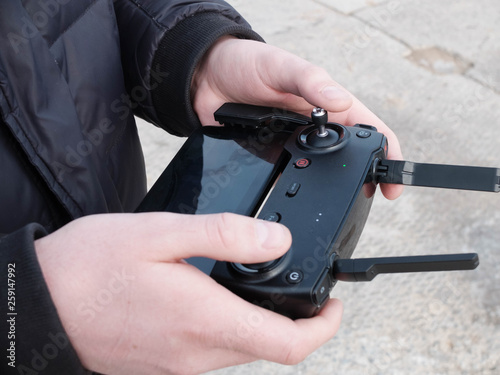 Man hands holding drone wireless remote control