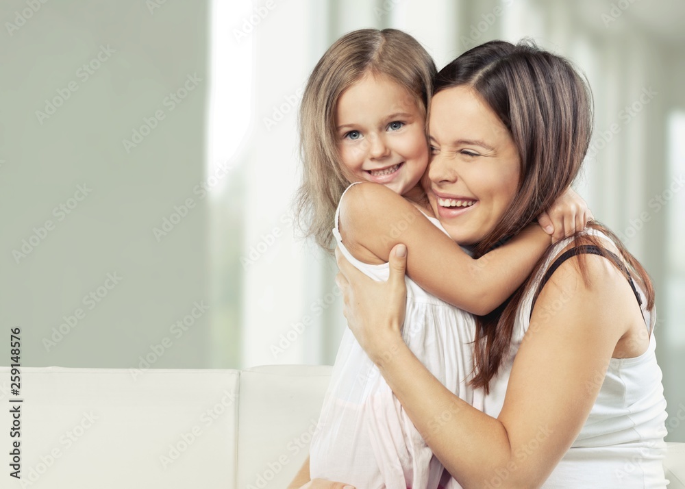 Happy Mother and daughter hugging Happy Mother and daughter hugging