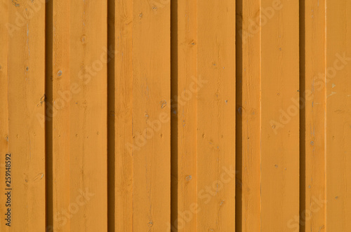 Yellow wooden wall. Texture
